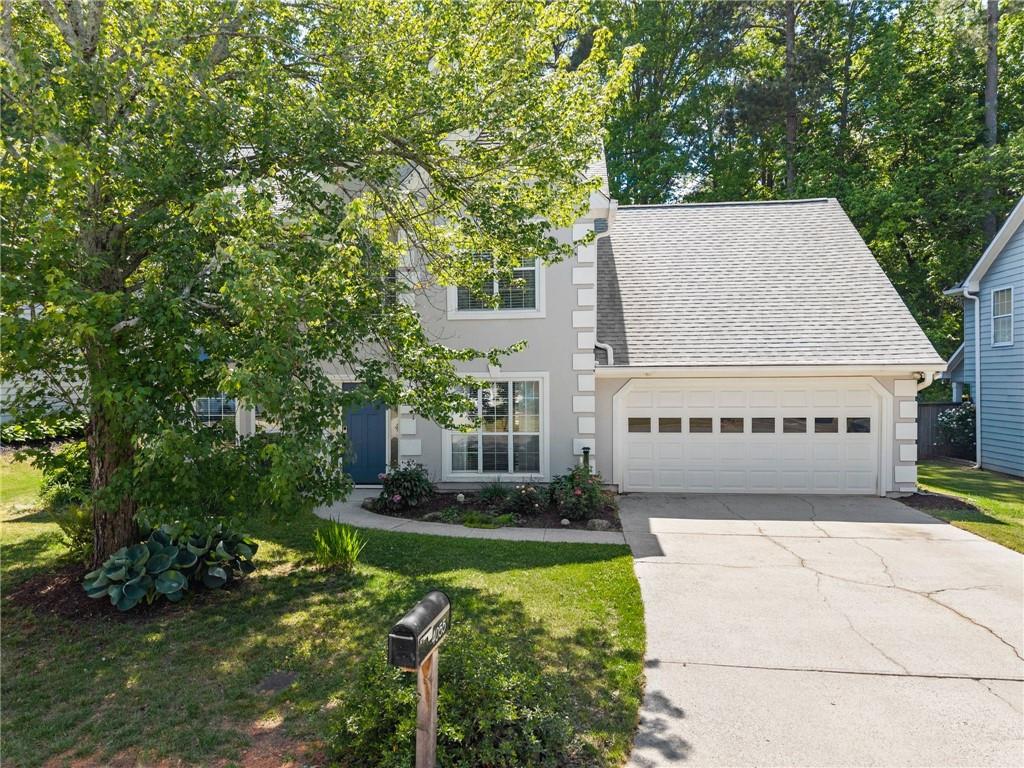 4055 Ivy Run Circle Duluth, GA 30096 - Photo 8 of 55 a view of a house with a yard