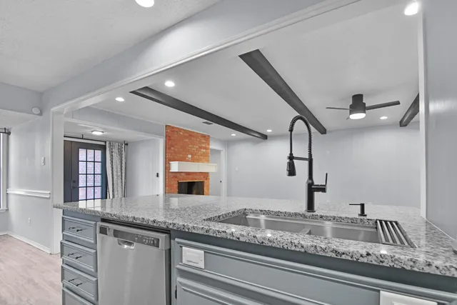 a view of a double sink and a mirror