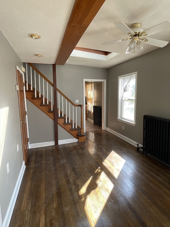 29 Jasper Street Saugus, MA 01906 - Photo 11 of 28 a view of entryway and hall with wooden floor