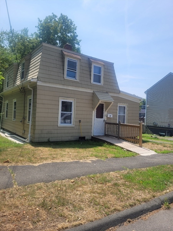 29 Jasper Street Saugus, MA 01906 - Photo 2 of 28 a view of a house with a yard