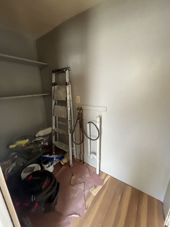 29 Jasper Street Saugus, MA 01906 - Photo 24 of 28 a view of a room with rack and bicycle