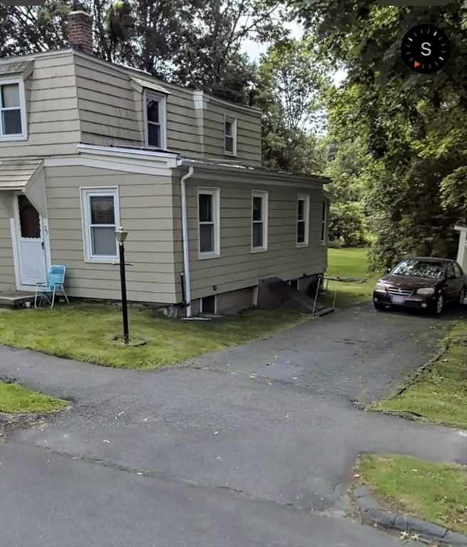 29 Jasper Street Saugus, MA 01906 - Photo 3 of 28 a view of a house with a backyard and trees