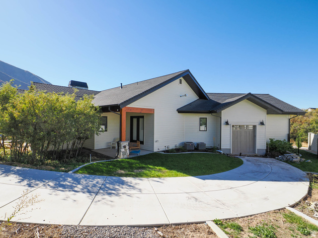3167 South Mapleton Ests Drive Mapleton, UT 84664 - Photo 29 of 30 Contemporary exterior with white siding, dark trim, and a dark shingle roof