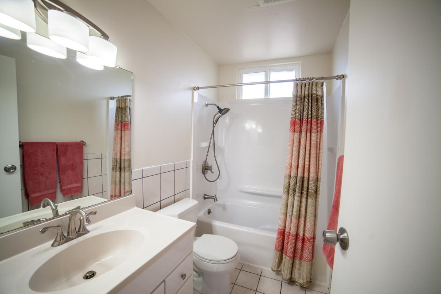 438 Firecrest Avenue Pacifica, CA 94044 - Photo 16 of 27 a bathroom with a sink toilet and shower