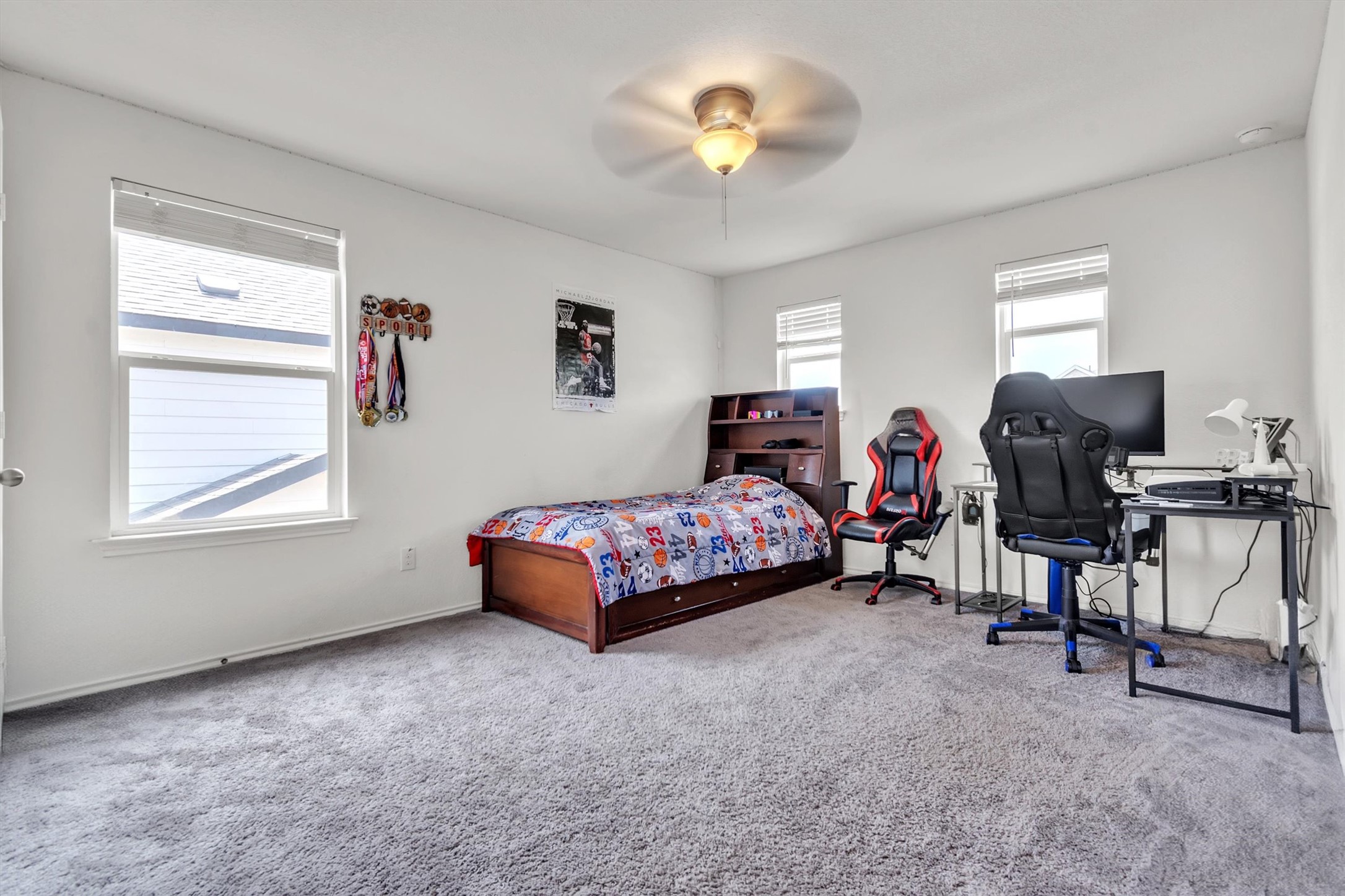 282 Crimson Lane Kyle, TX 78640 - Photo 11 of 18 Carpeted bedroom with ceiling fan and an office area