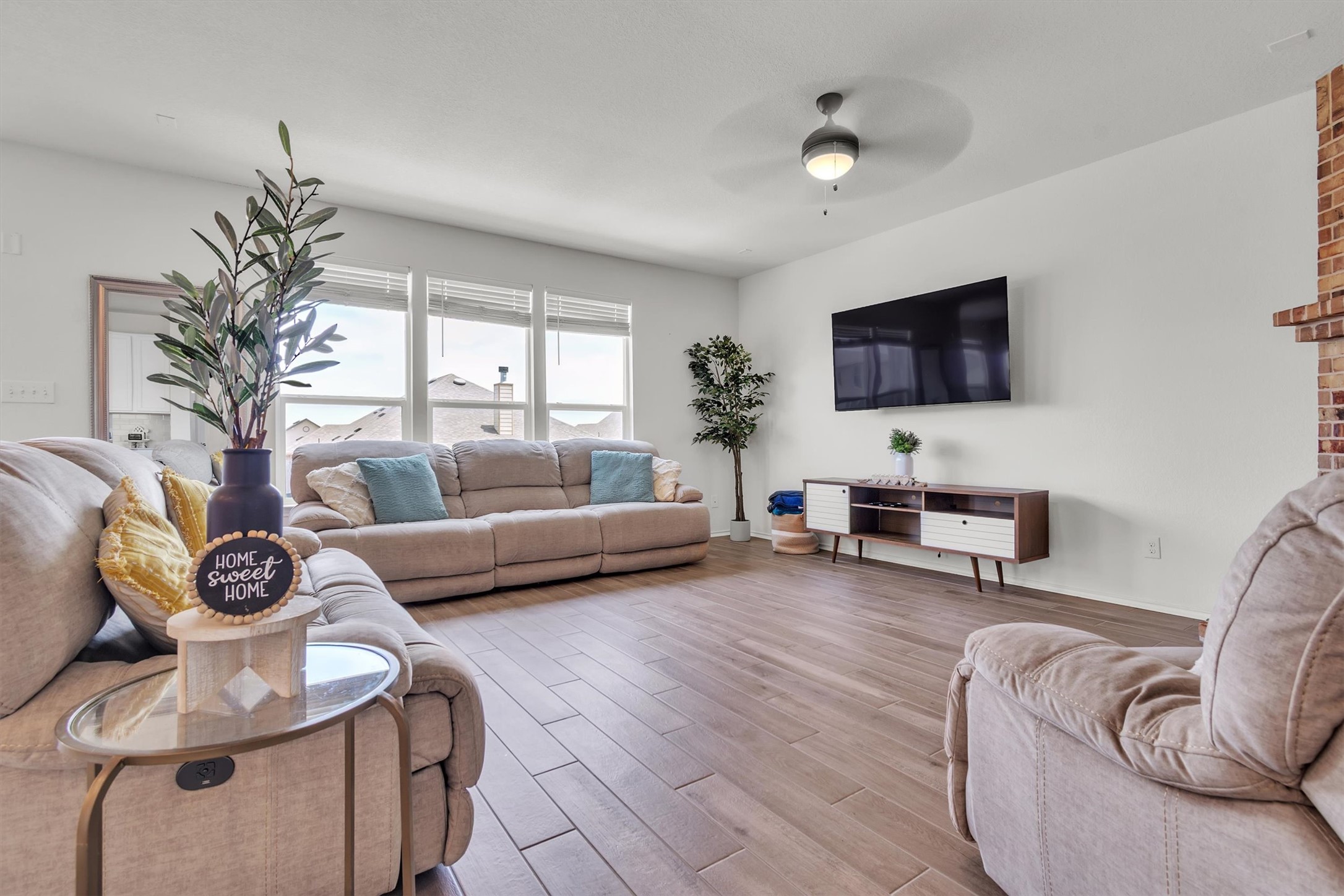 282 Crimson Lane Kyle, TX 78640 - Photo 6 of 18 Living room featuring light wood-style flooring and ceiling fan