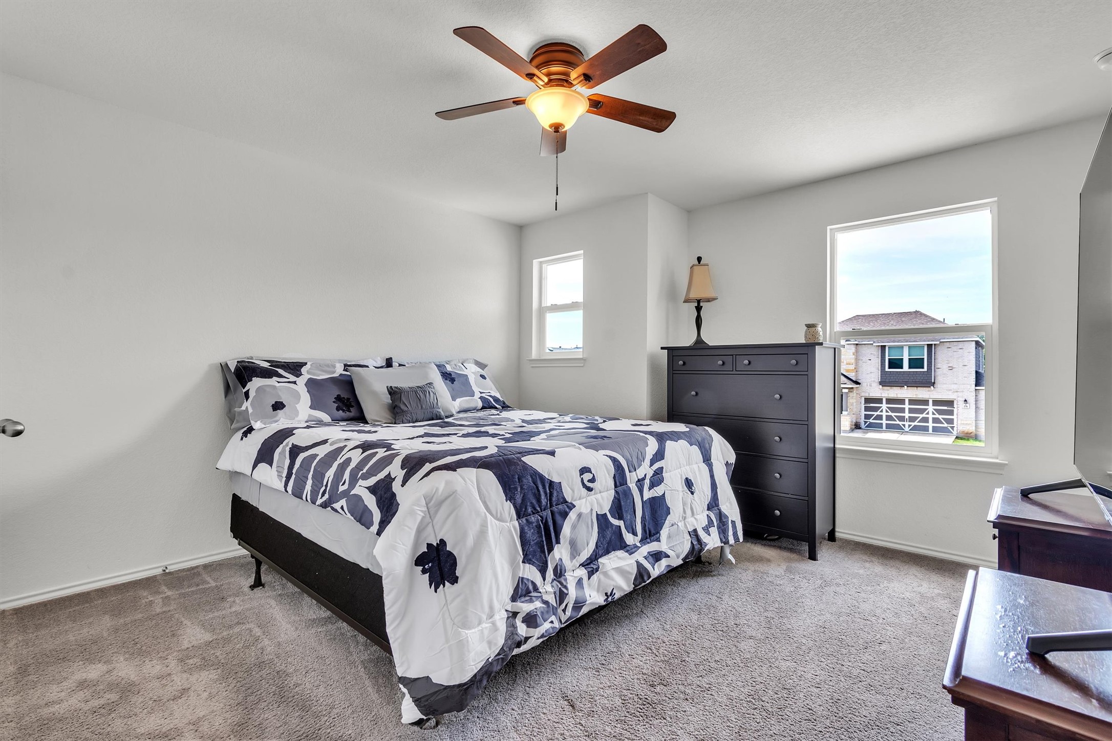 282 Crimson Lane Kyle, TX 78640 - Photo 9 of 18 Carpeted bedroom featuring ceiling fan and baseboards