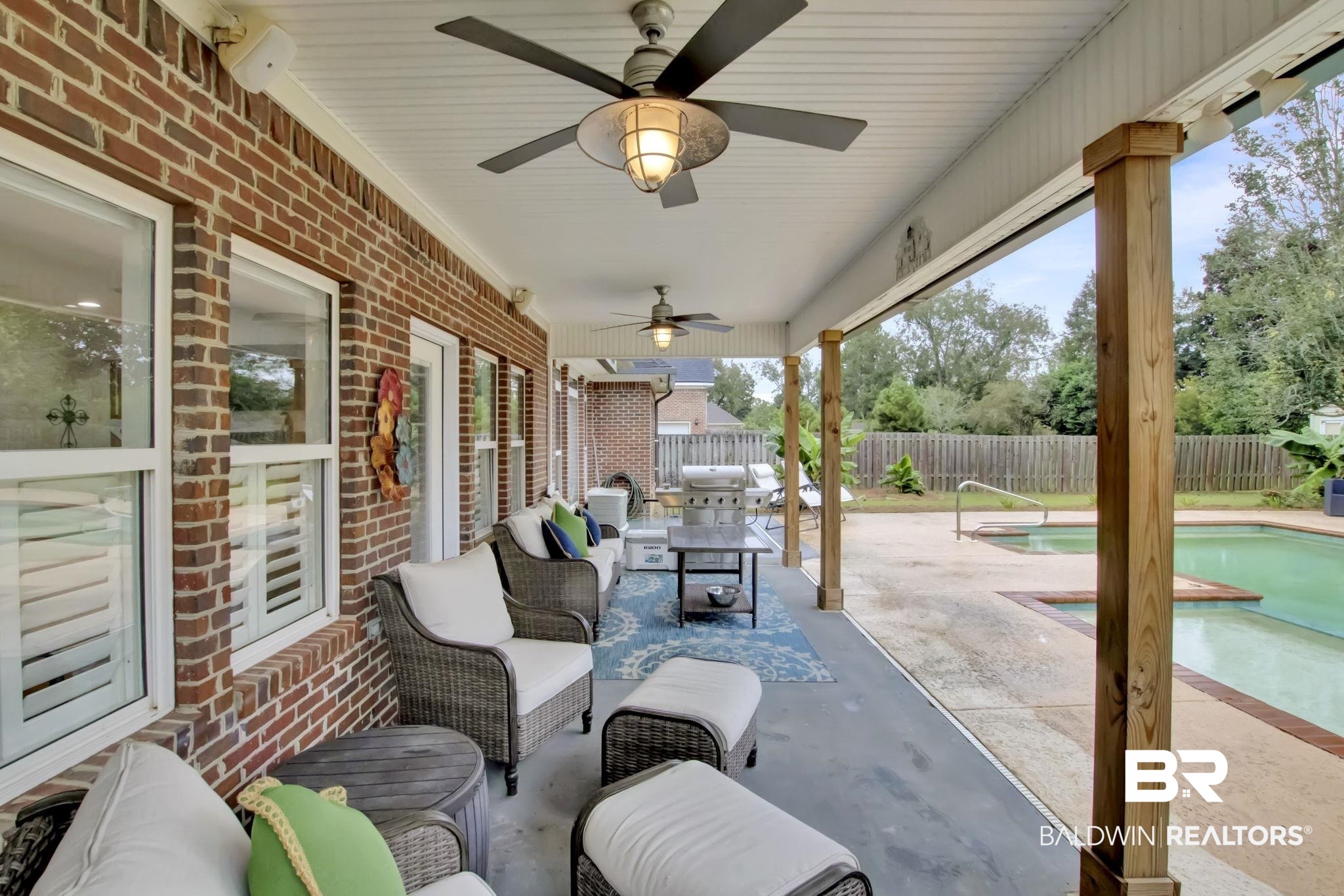 9002 Parliament Circle Daphne, AL 36526 - Photo 71 of 73 View of covered patio featuring a fenced in pool, an outdoor hangout area, and ceiling fan