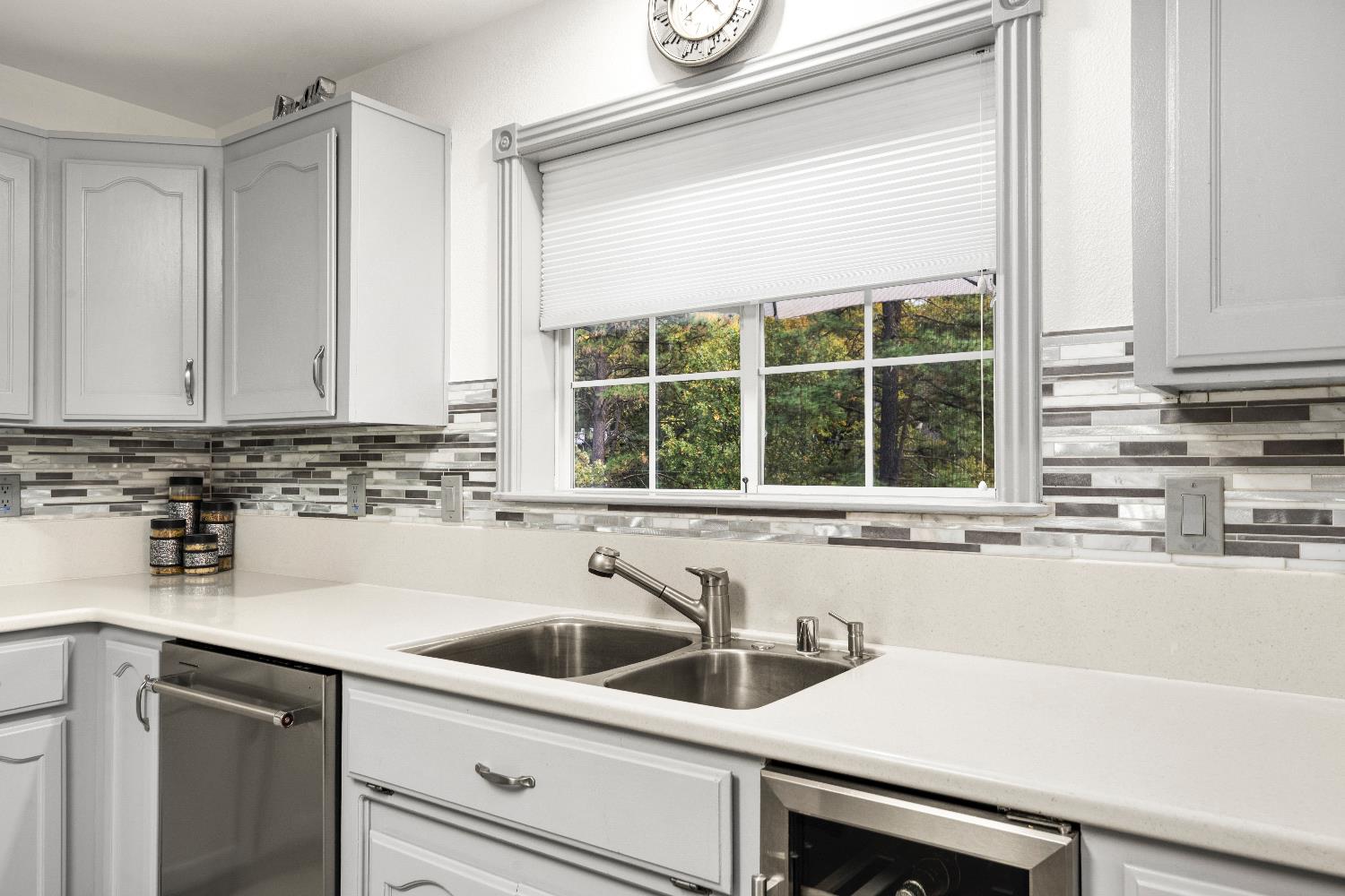 1049 Kimi Way Placerville, CA 95667 - Photo 16 of 66 a kitchen with a sink and a window
