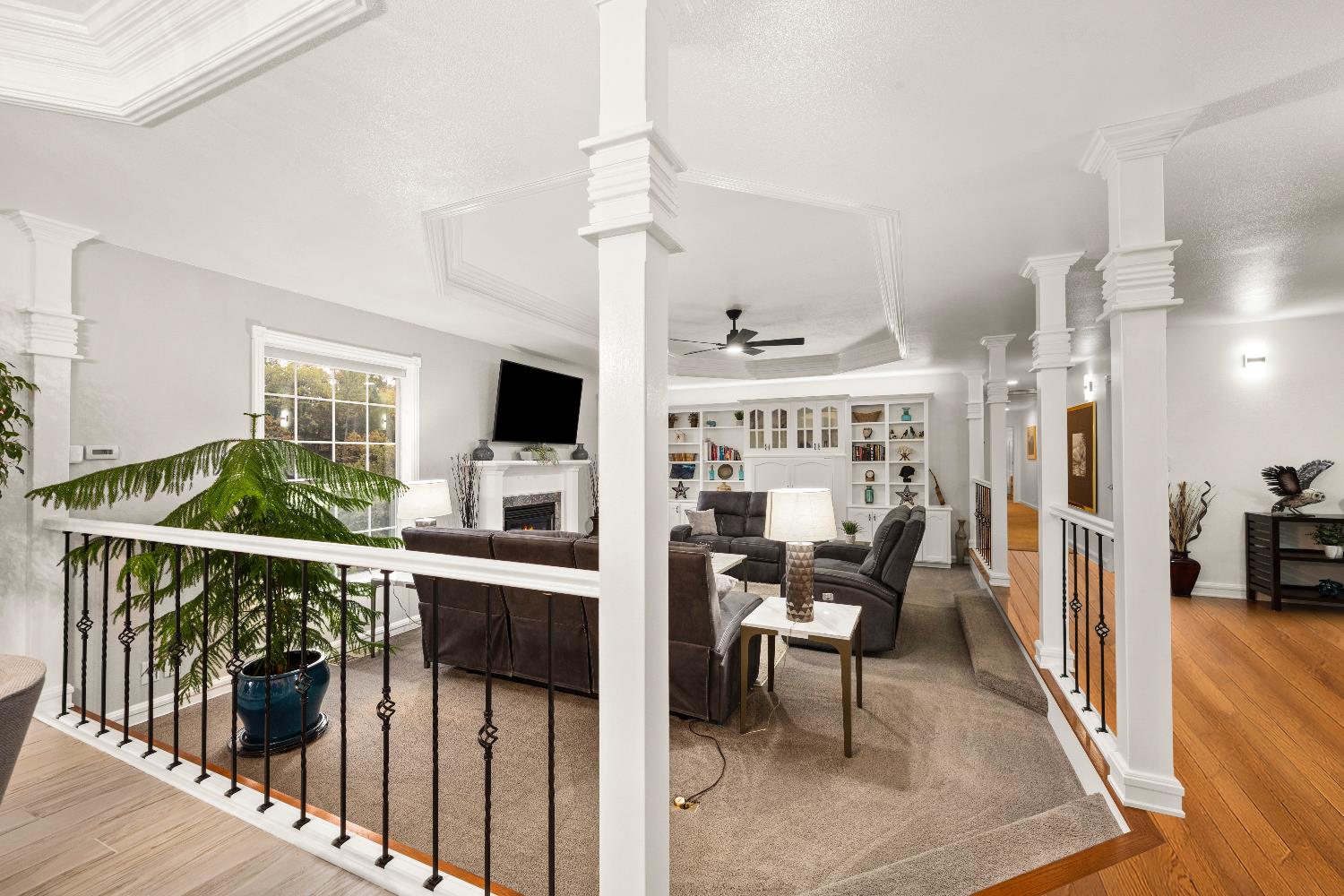 1049 Kimi Way Placerville, CA 95667 - Photo 20 of 66 a open kitchen with stainless steel appliances kitchen island granite countertop a table chairs in it and wooden floors