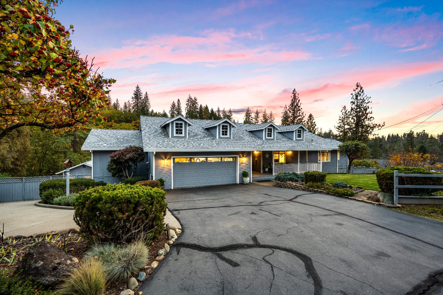 1049 Kimi Way Placerville, CA 95667 - Photo 2 of 66 a view of a street with a building in the background