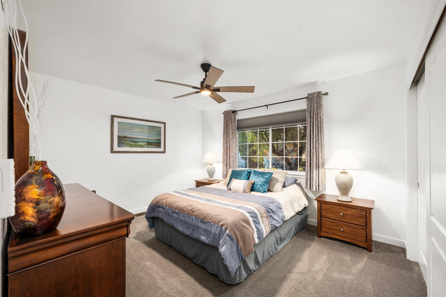 1049 Kimi Way Placerville, CA 95667 - Photo 28 of 66 a bedroom with a bed and window