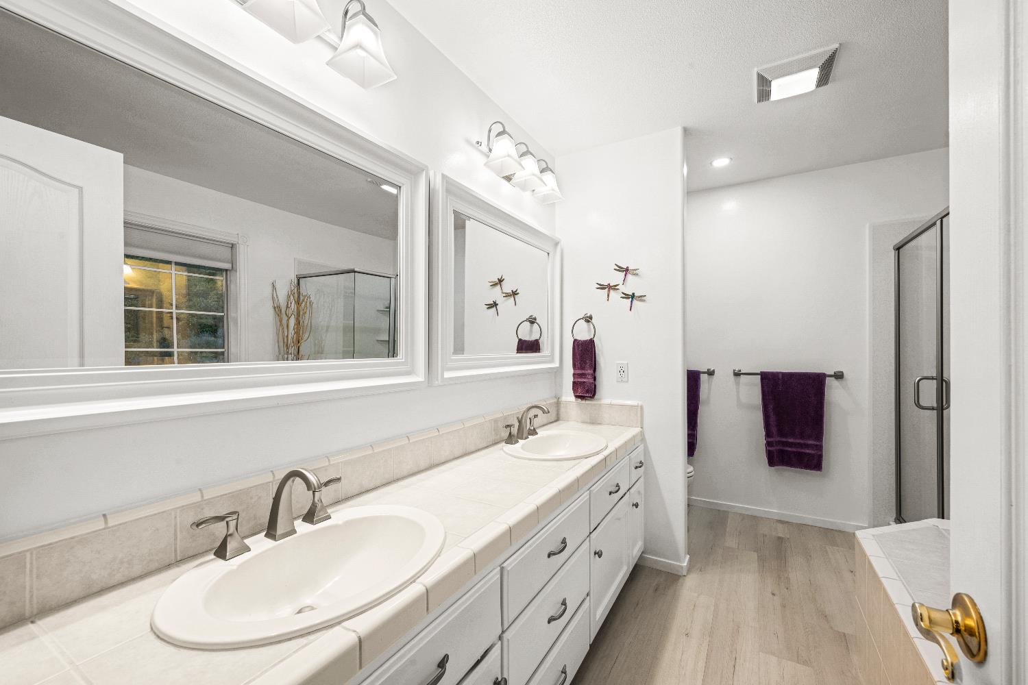 1049 Kimi Way Placerville, CA 95667 - Photo 35 of 66 a bathroom with a double vanity sink mirror and double
