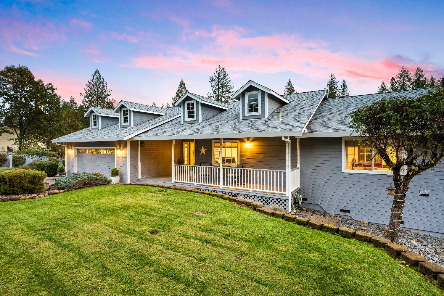 1049 Kimi Way Placerville, CA 95667 - Photo 4 of 66 a front view of a house with a yard