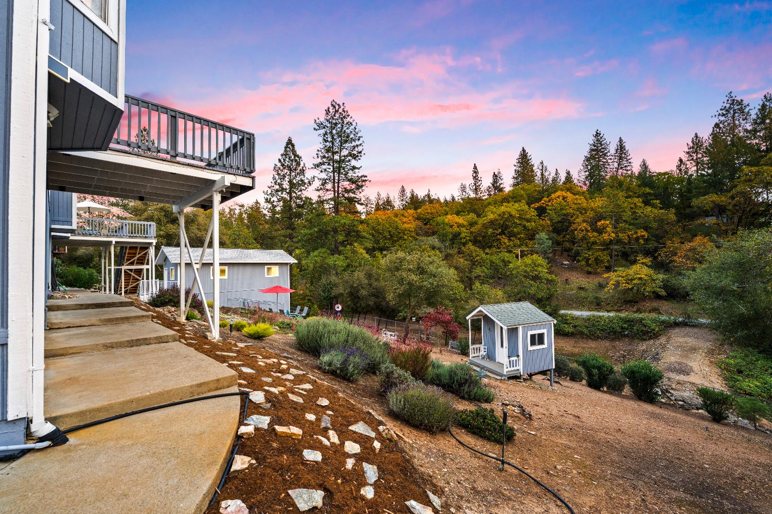 1049 Kimi Way Placerville, CA 95667 - Photo 45 of 66 a view of a house with a patio