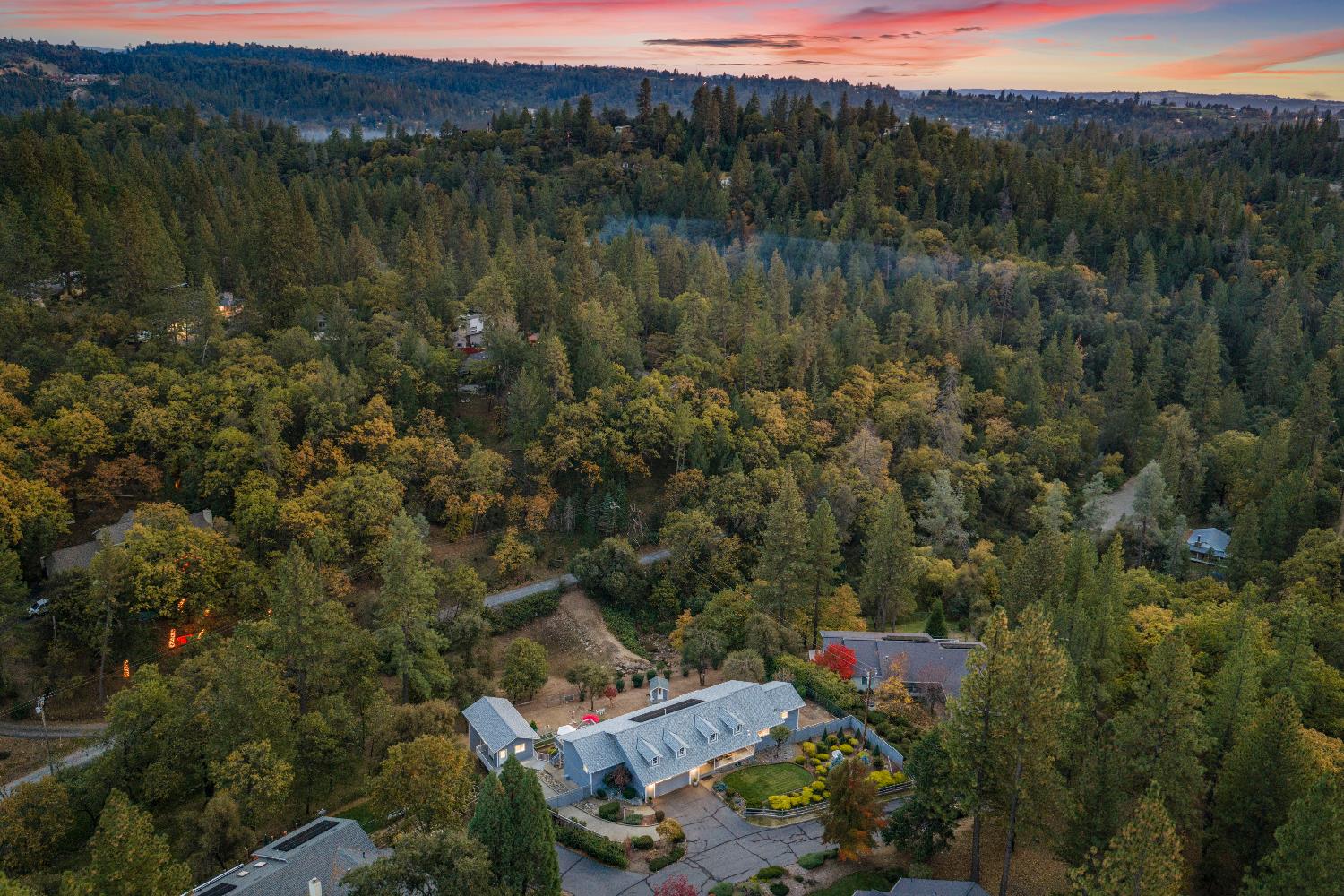 1049 Kimi Way Placerville, CA 95667 - Photo 51 of 66 a view of a lake with a mountain and a forest