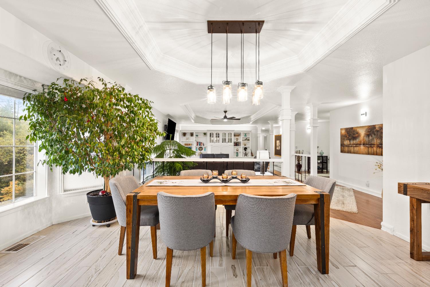 1049 Kimi Way Placerville, CA 95667 - Photo 10 of 66 a dining room with furniture a chandelier and wooden floor