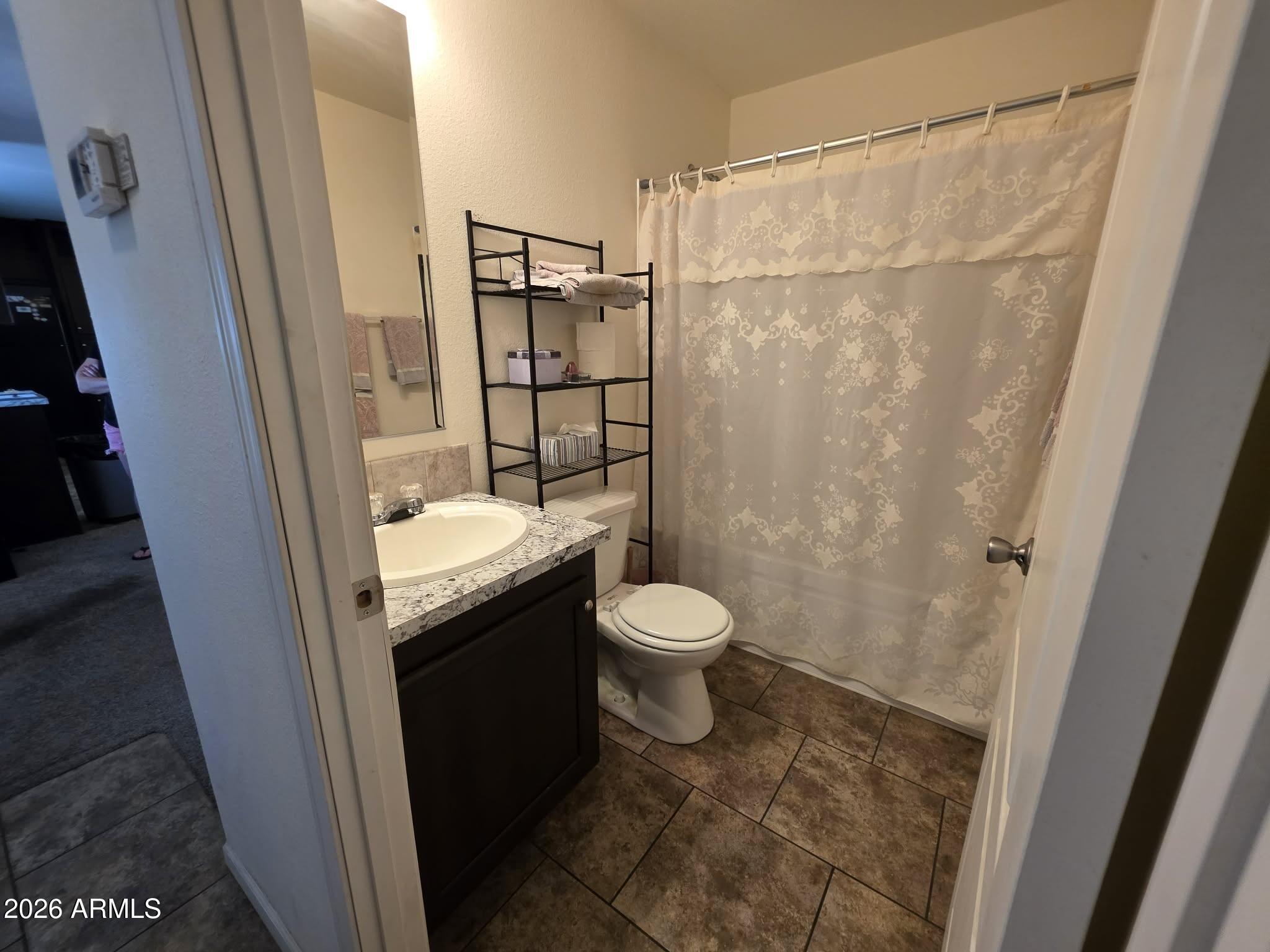 15606 South Gilbert Road, Unit 99 Chandler, AZ 85225 - Photo 13 of 23 Guest Bath