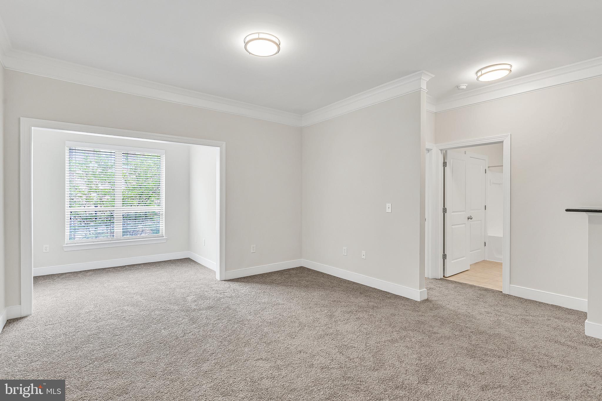 5400 Auth Road, Unit 337 Suitland, MD 20746 - Photo 11 of 37 an empty room with a empty space and a window
