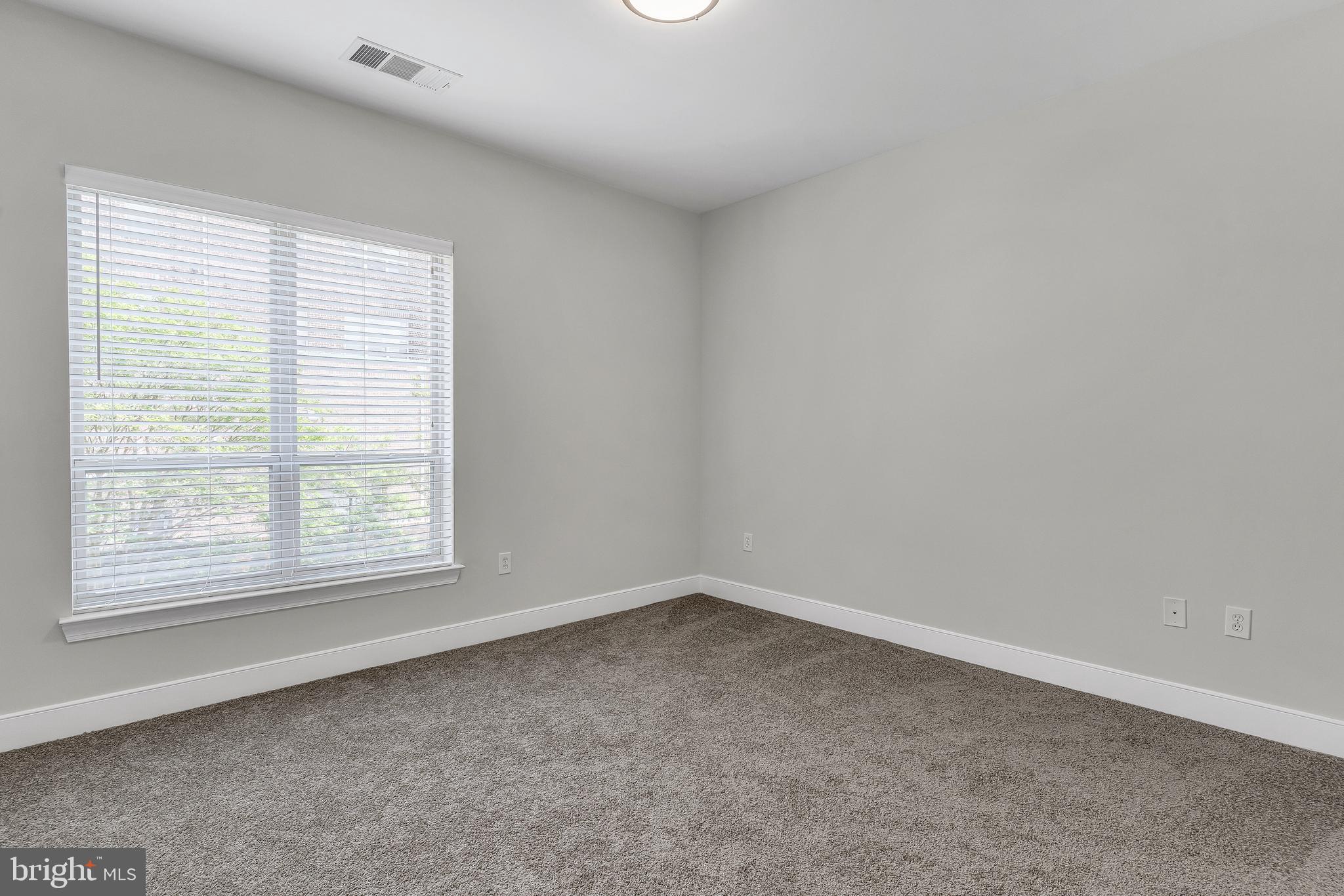 5400 Auth Road, Unit 337 Suitland, MD 20746 - Photo 19 of 37 an empty room with a window