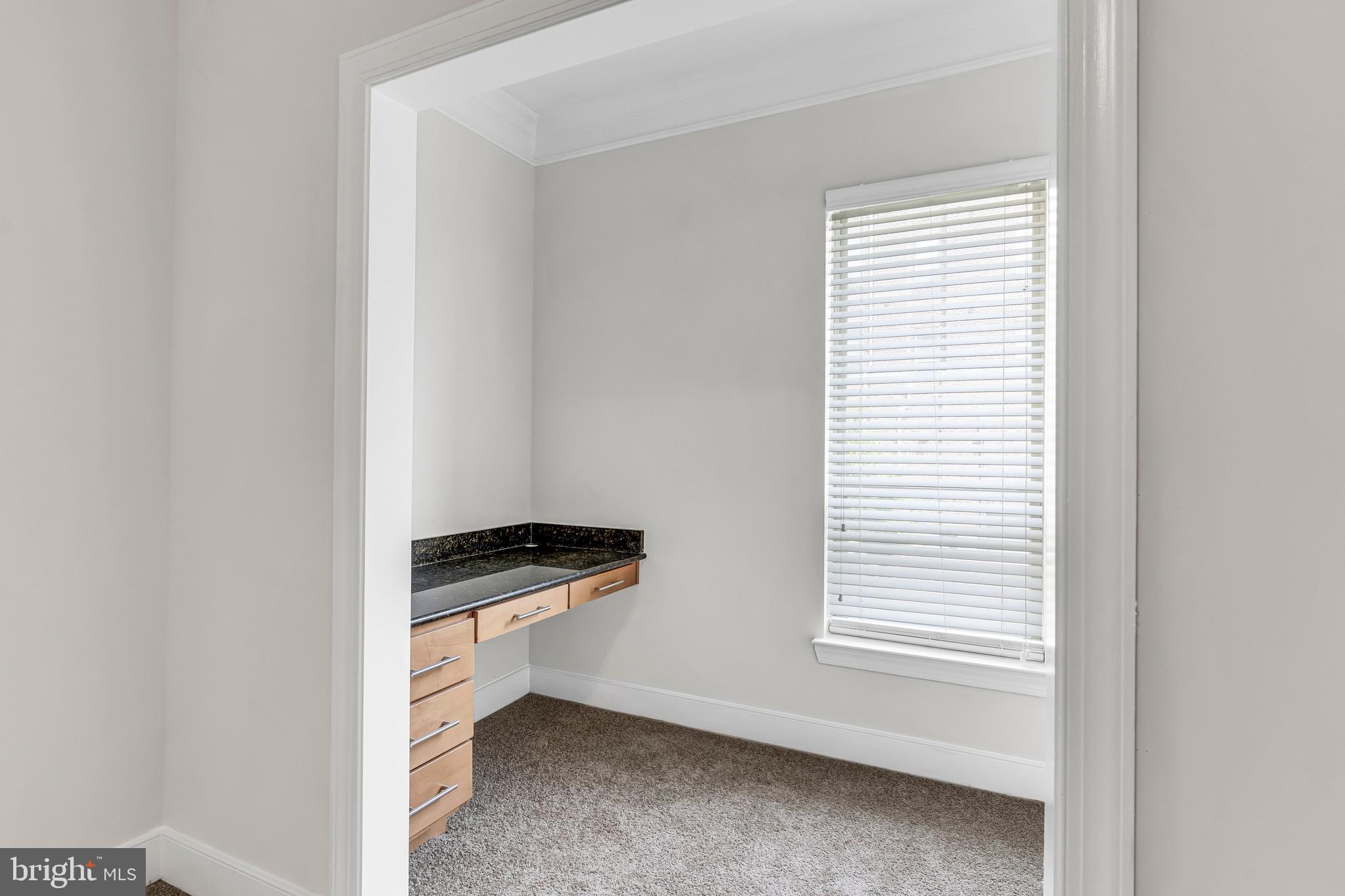 5400 Auth Road, Unit 337 Suitland, MD 20746 - Photo 28 of 37 a view of an empty room with a window
