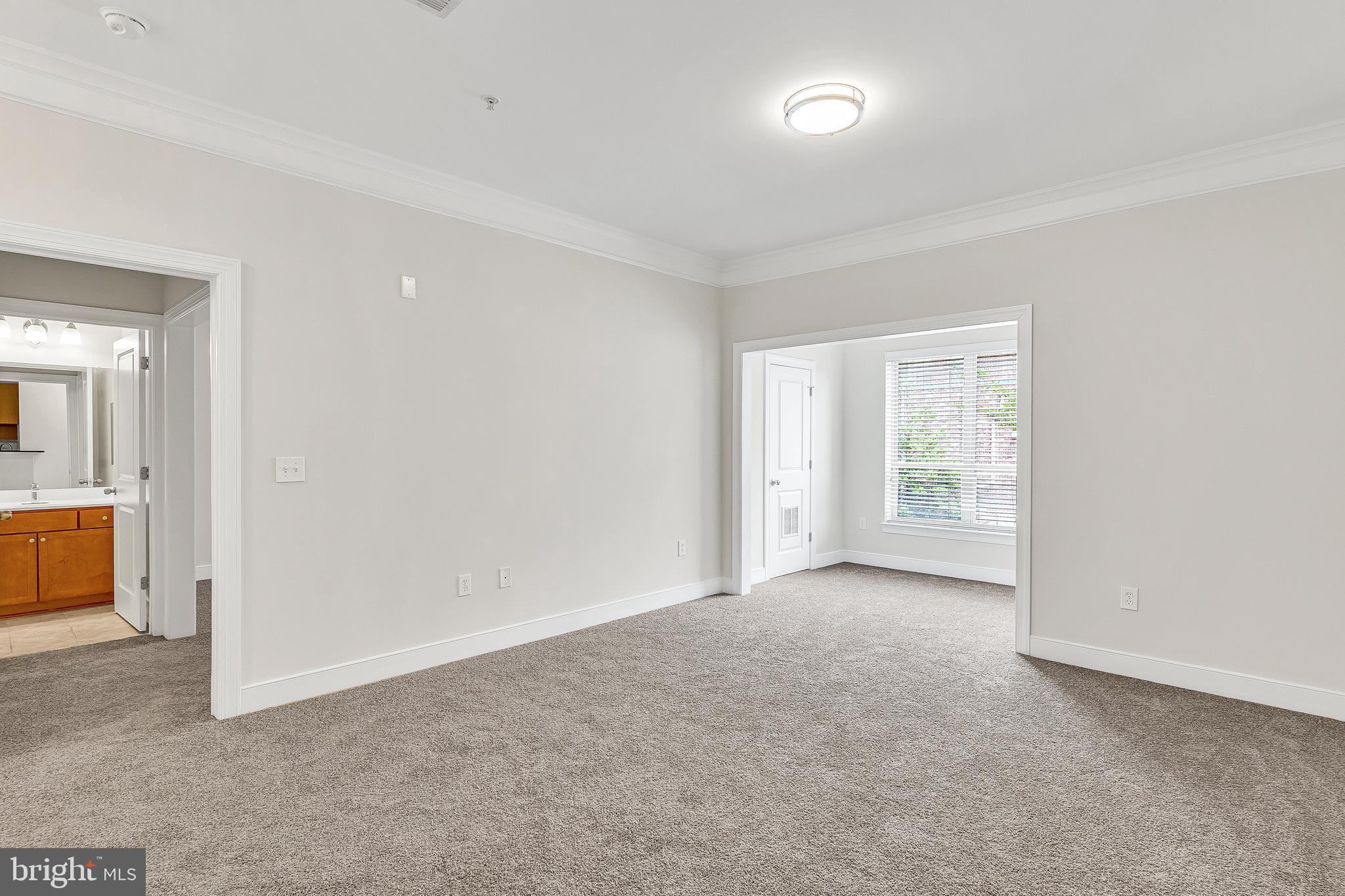 5400 Auth Road, Unit 337 Suitland, MD 20746 - Photo 10 of 37 an empty room with a bathroom
