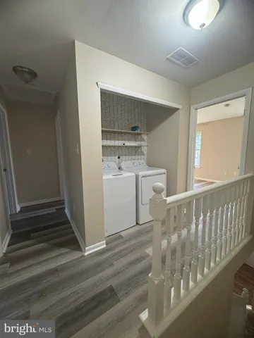 a utility room with cabinets