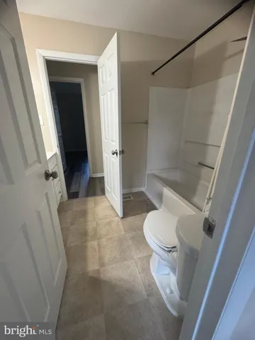 a bathroom with a sink and toilet