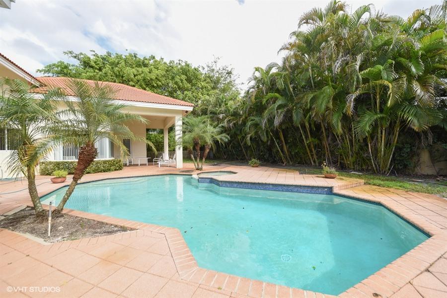 3912 Northwest 52nd Street Boca Raton, FL 33496 - Photo 17 of 17 11_3912NW52ndSt_29_Pool_LowRes