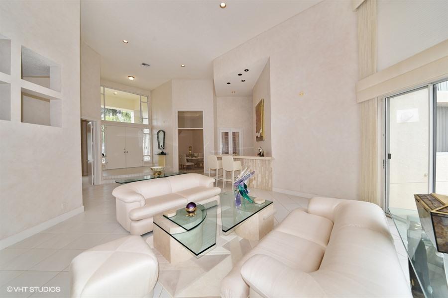 3912 Northwest 52nd Street Boca Raton, FL 33496 - Photo 5 of 17 01_3912NW52ndSt_148_FoyerLivingRoom_LowR