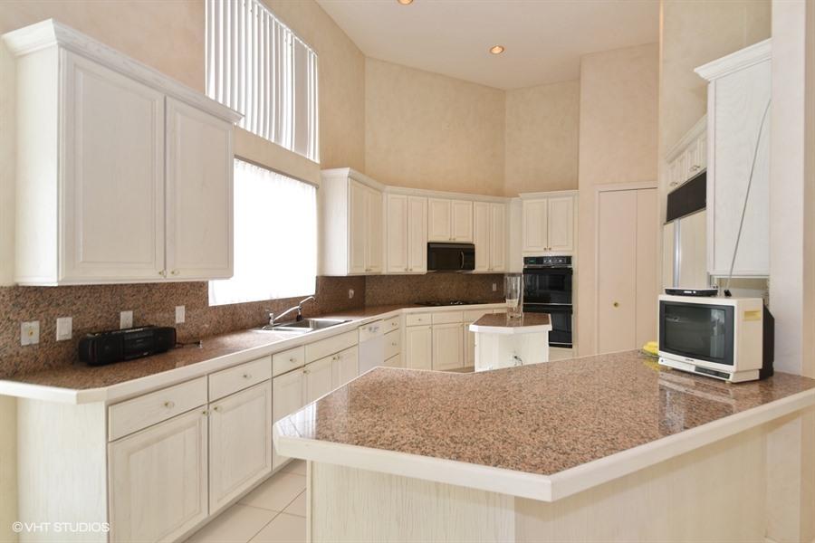 3912 Northwest 52nd Street Boca Raton, FL 33496 - Photo 9 of 17 03_3912NW52ndSt_5_Kitchen_LowRes