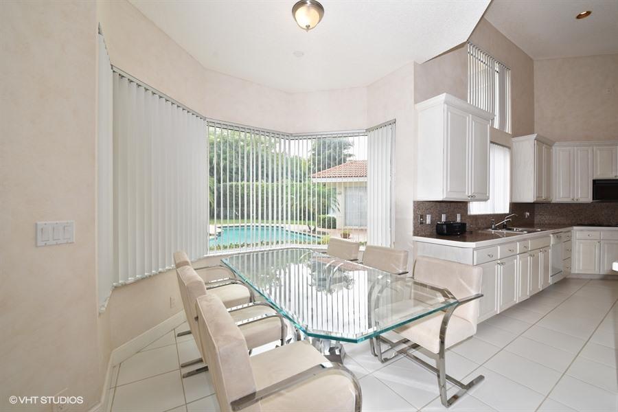 3912 Northwest 52nd Street Boca Raton, FL 33496 - Photo 10 of 17 04_3912NW52ndSt_191_KitchenBreakfastRoom