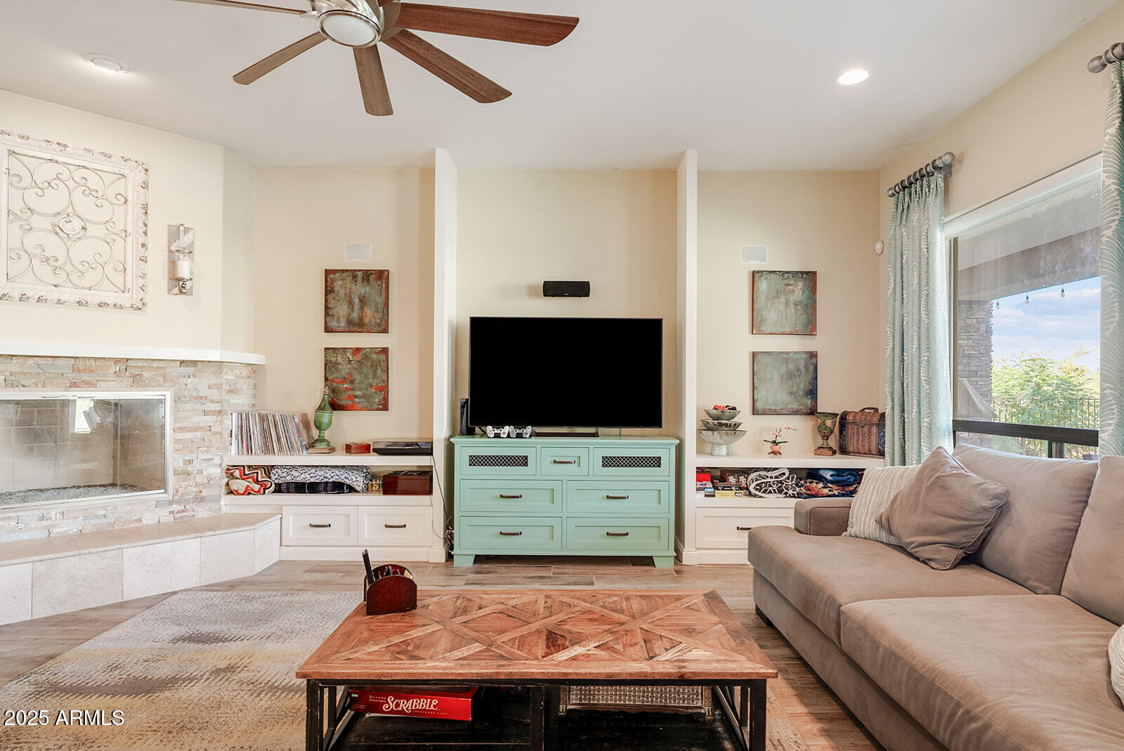 8705 South 24th Place Phoenix, AZ 85042 - Photo 13 of 43 a living room with furniture and a flat screen tv
