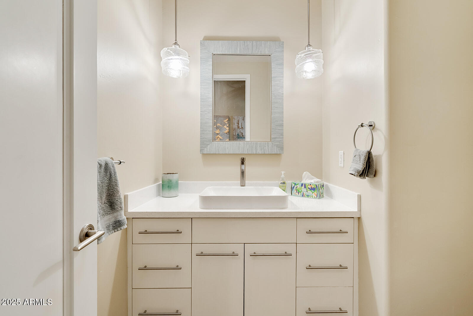 8705 South 24th Place Phoenix, AZ 85042 - Photo 20 of 43 a bathroom with a sink vanity and mirror