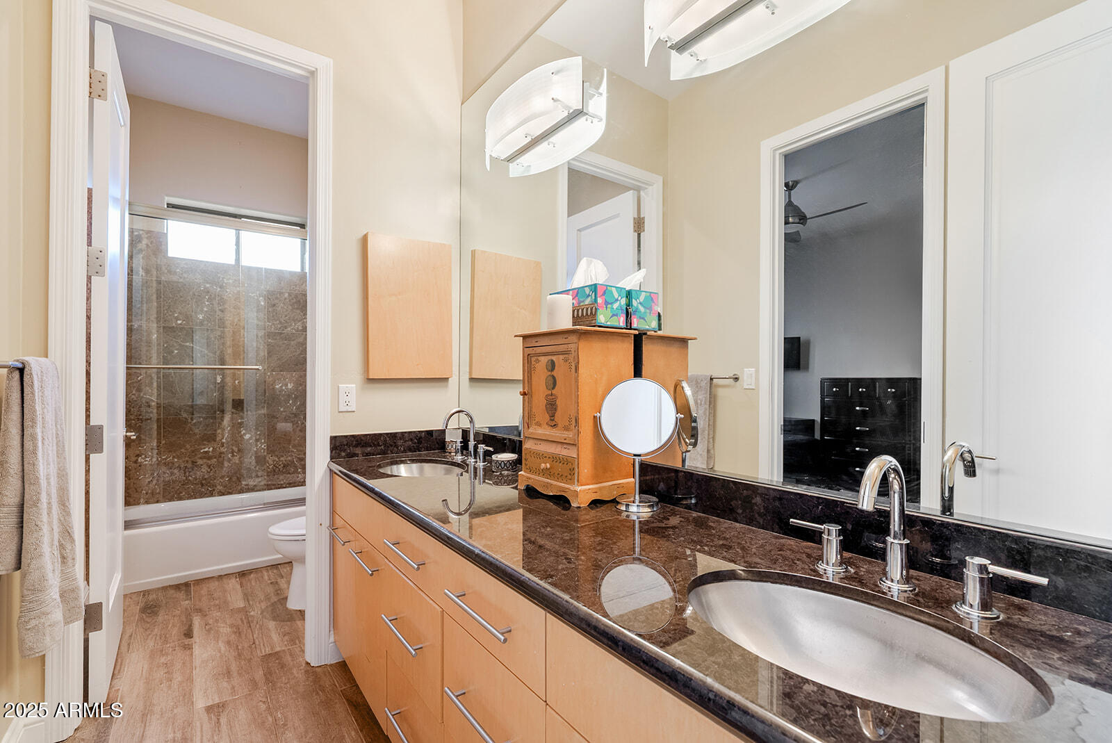 8705 South 24th Place Phoenix, AZ 85042 - Photo 24 of 43 a bathroom with a granite countertop double vanity sink and mirror