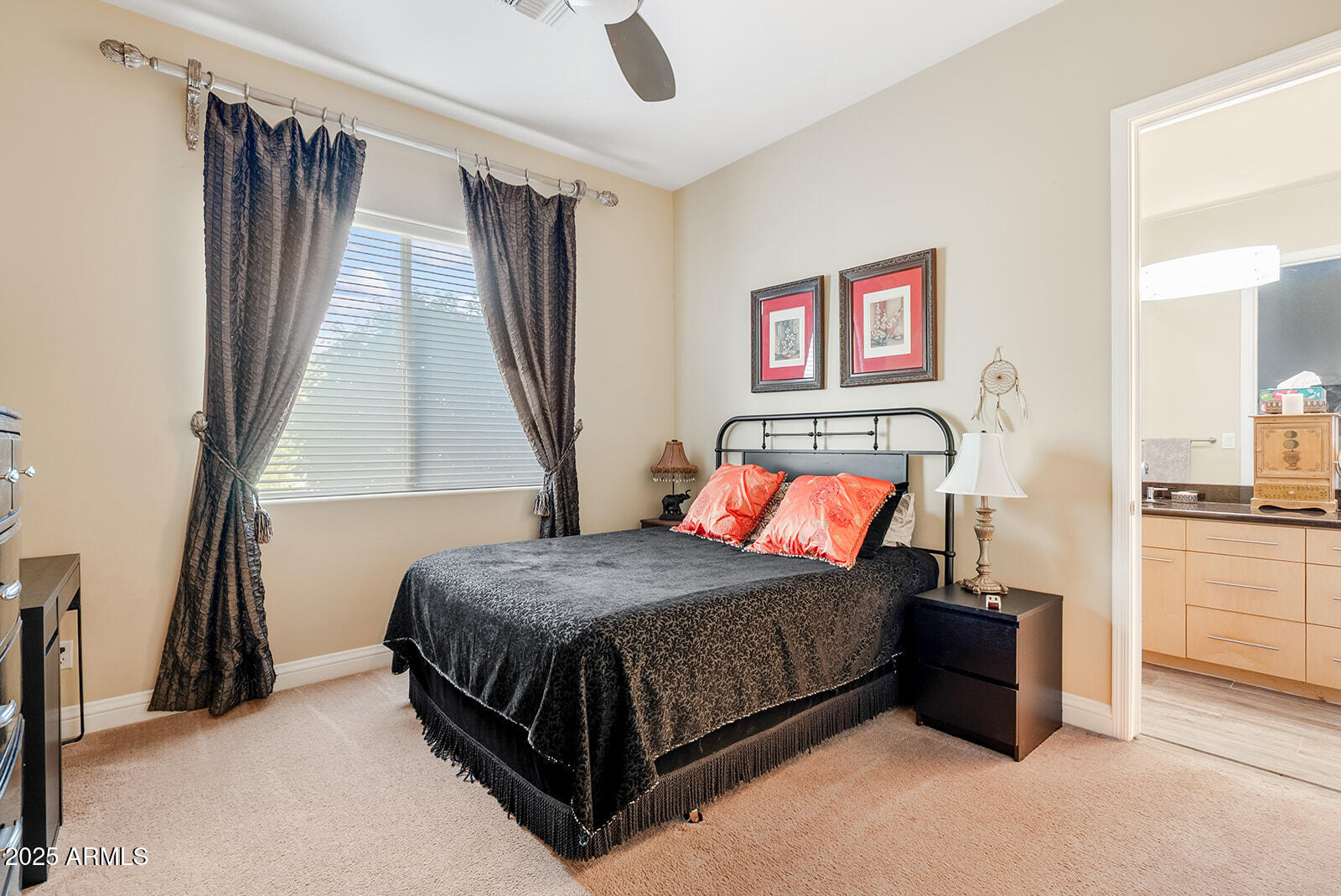 8705 South 24th Place Phoenix, AZ 85042 - Photo 26 of 43 a bedroom with a bed and a table