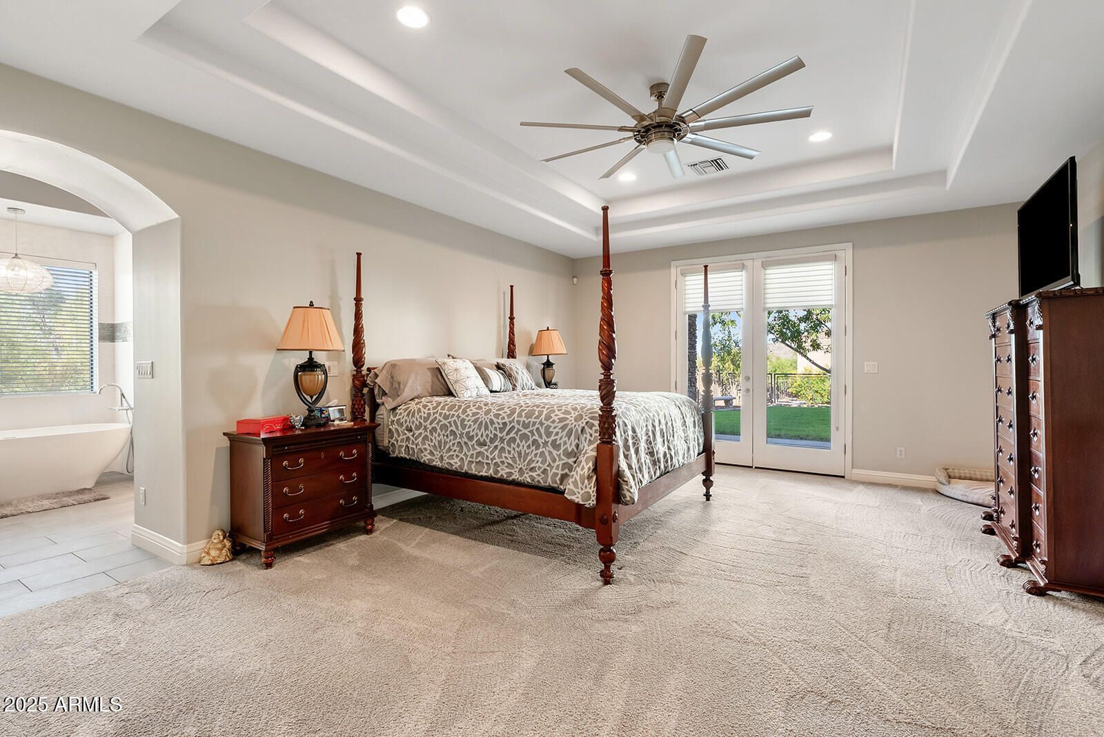 8705 South 24th Place Phoenix, AZ 85042 - Photo 28 of 43 a living room with furniture and a flat screen tv