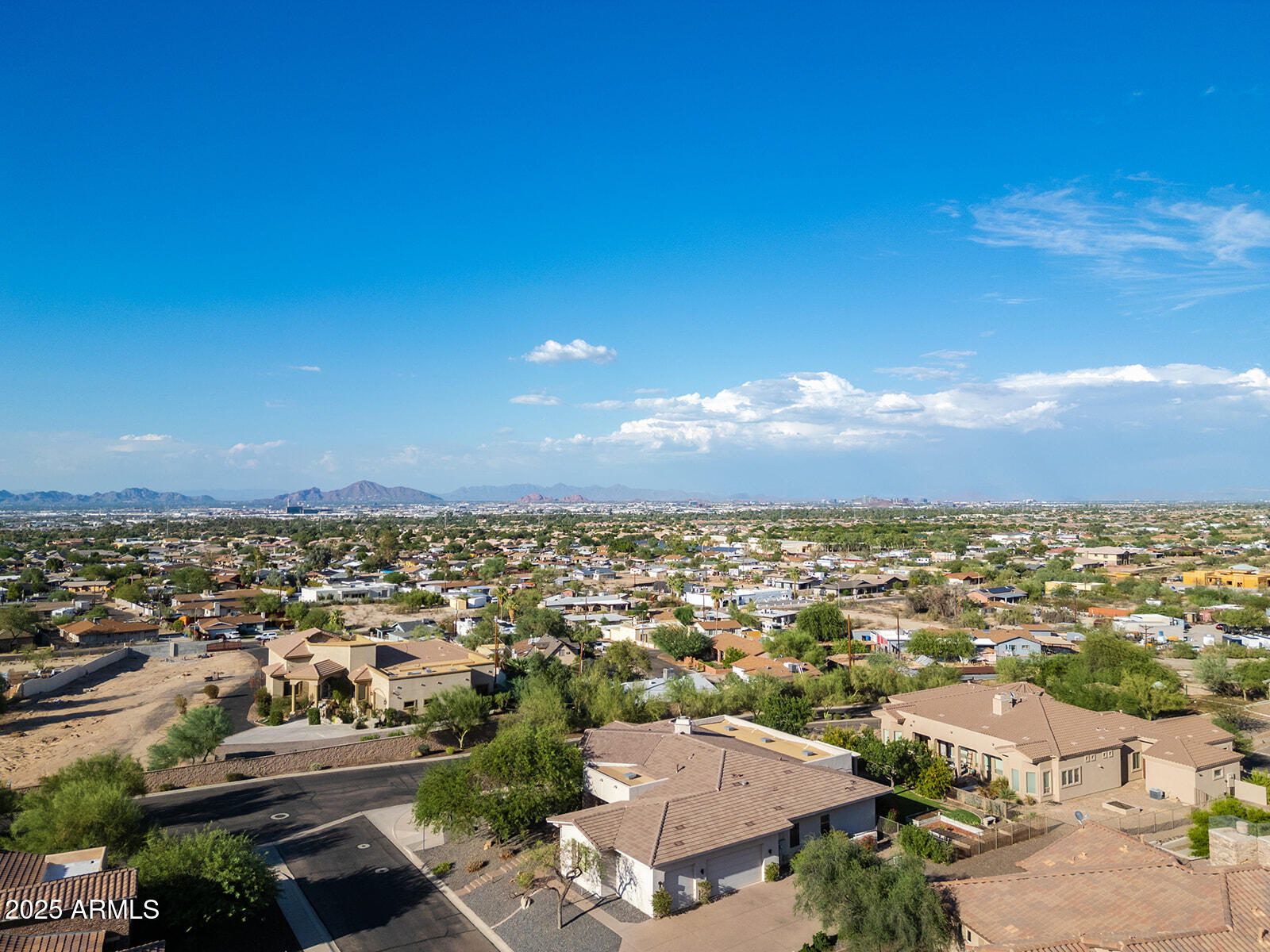 8705 South 24th Place Phoenix, AZ 85042 - Photo 3 of 43 an aerial view of residential houses with outdoor space