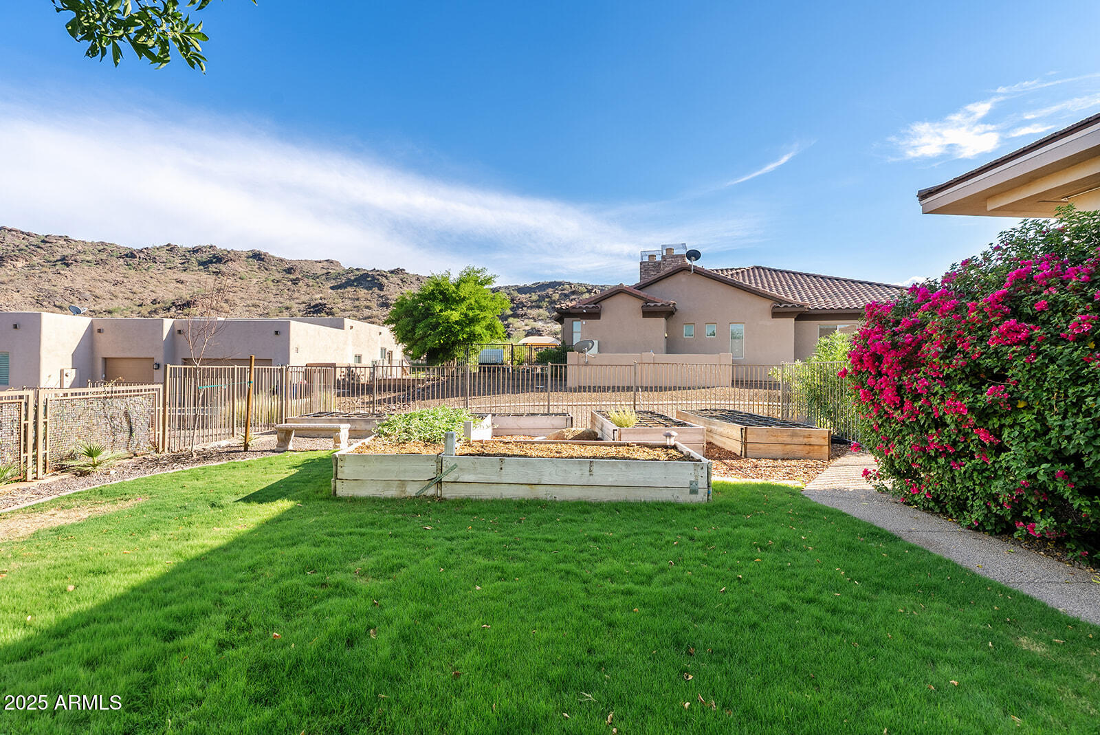 8705 South 24th Place Phoenix, AZ 85042 - Photo 38 of 43 a view of a house with a yard porch and sitting area