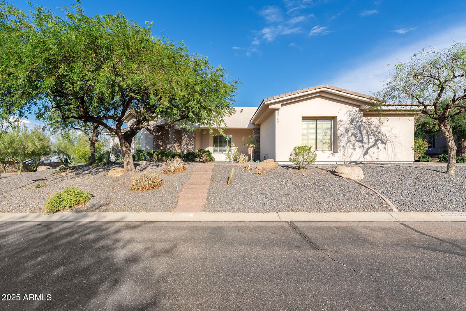 8705 South 24th Place Phoenix, AZ 85042 - Photo 4 of 43 a view of road with large trees
