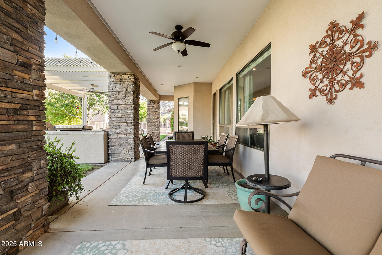 8705 South 24th Place Phoenix, AZ 85042 - Photo 42 of 43 a view of workspace with furniture and a potted plant