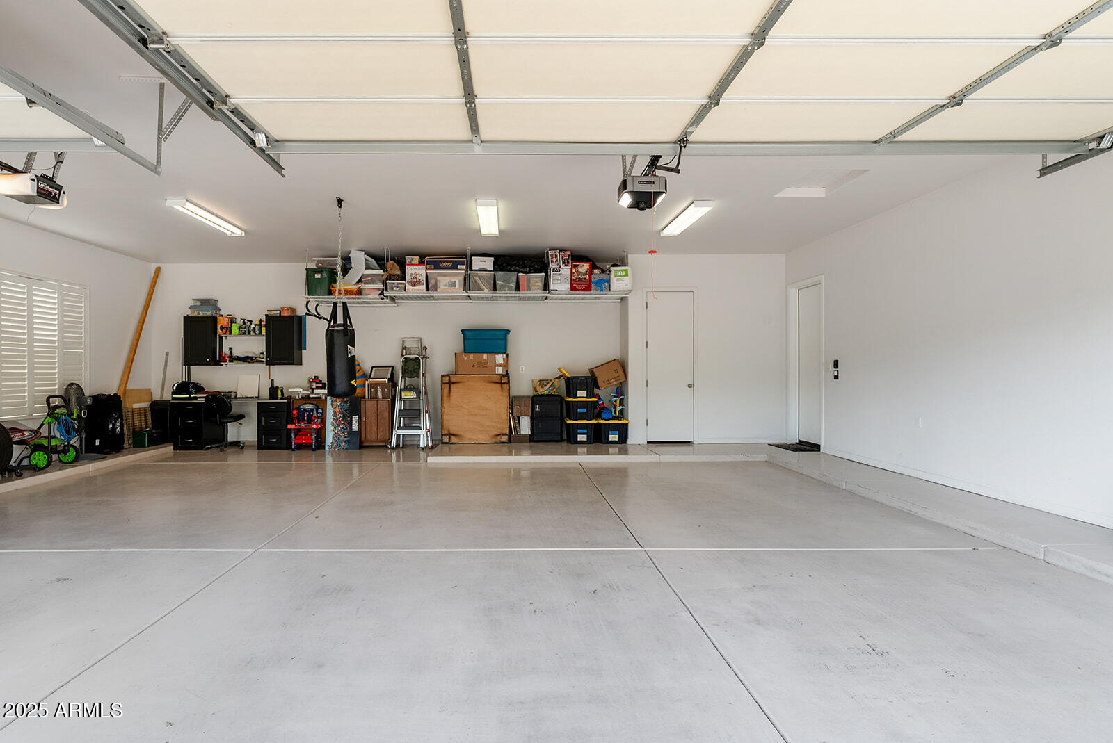 8705 South 24th Place Phoenix, AZ 85042 - Photo 43 of 43 a view of a garage with furniture