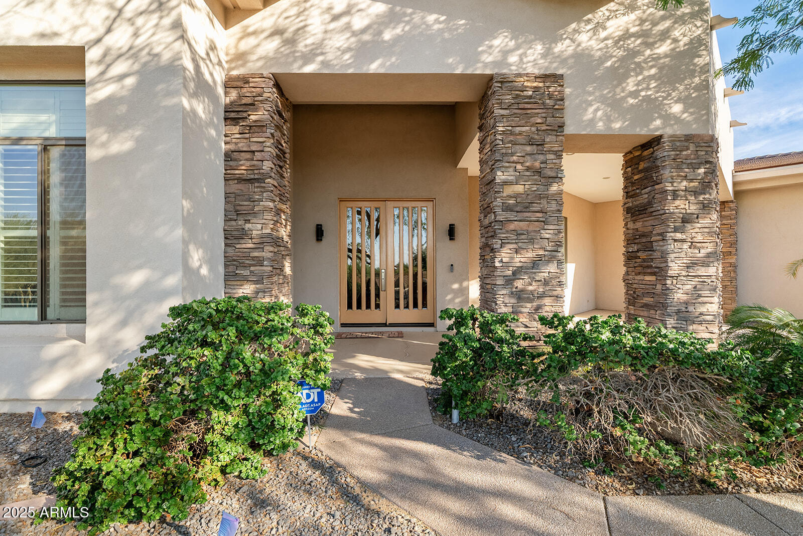 8705 South 24th Place Phoenix, AZ 85042 - Photo 6 of 43 a front view of a house