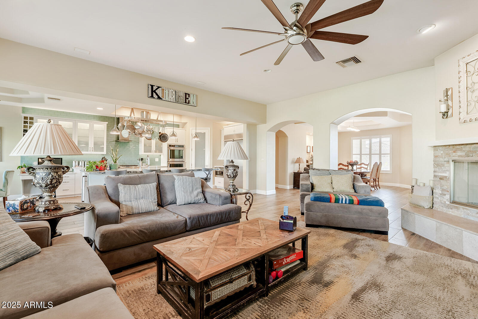 8705 South 24th Place Phoenix, AZ 85042 - Photo 10 of 43 a living room with furniture and a large window