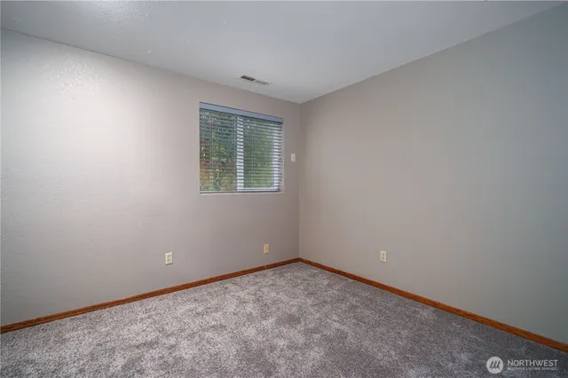 a view of a house with a swimming pool and porch
