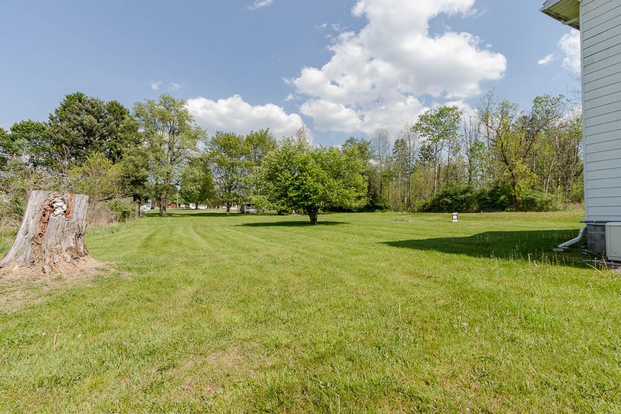203 Gorton Road Moshannon, PA 16859 - Photo 35 of 39 Spacious green oasis under blue skies.