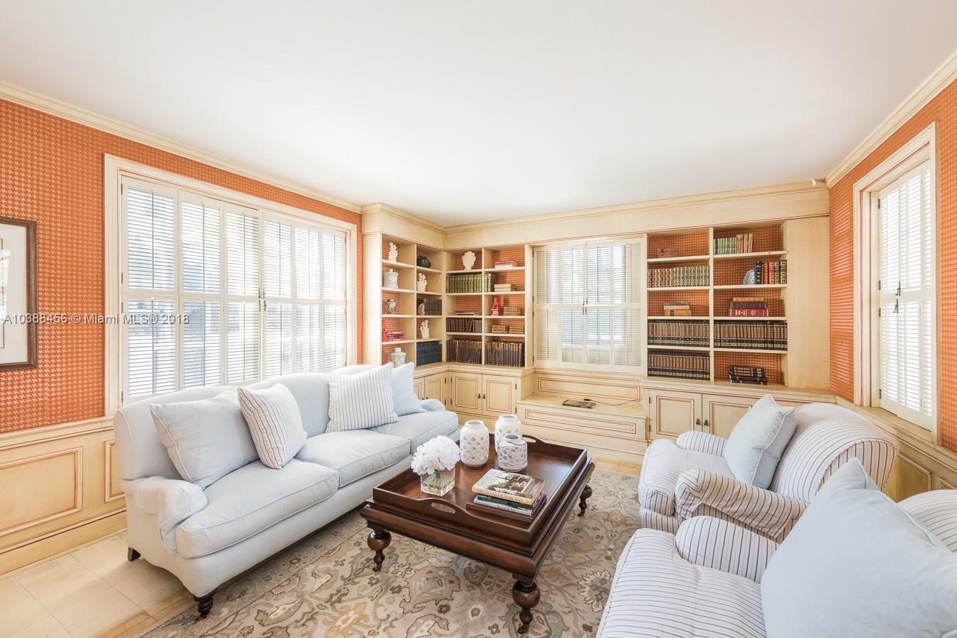 6645 Pine Tree Lane Miami Beach, FL 33141 - Photo 11 of 21 a living room with furniture and a large window