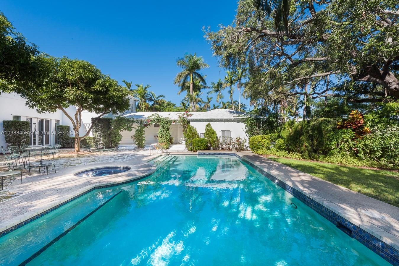 6645 Pine Tree Lane Miami Beach, FL 33141 - Photo 18 of 21 a view of swimming pool with a yard