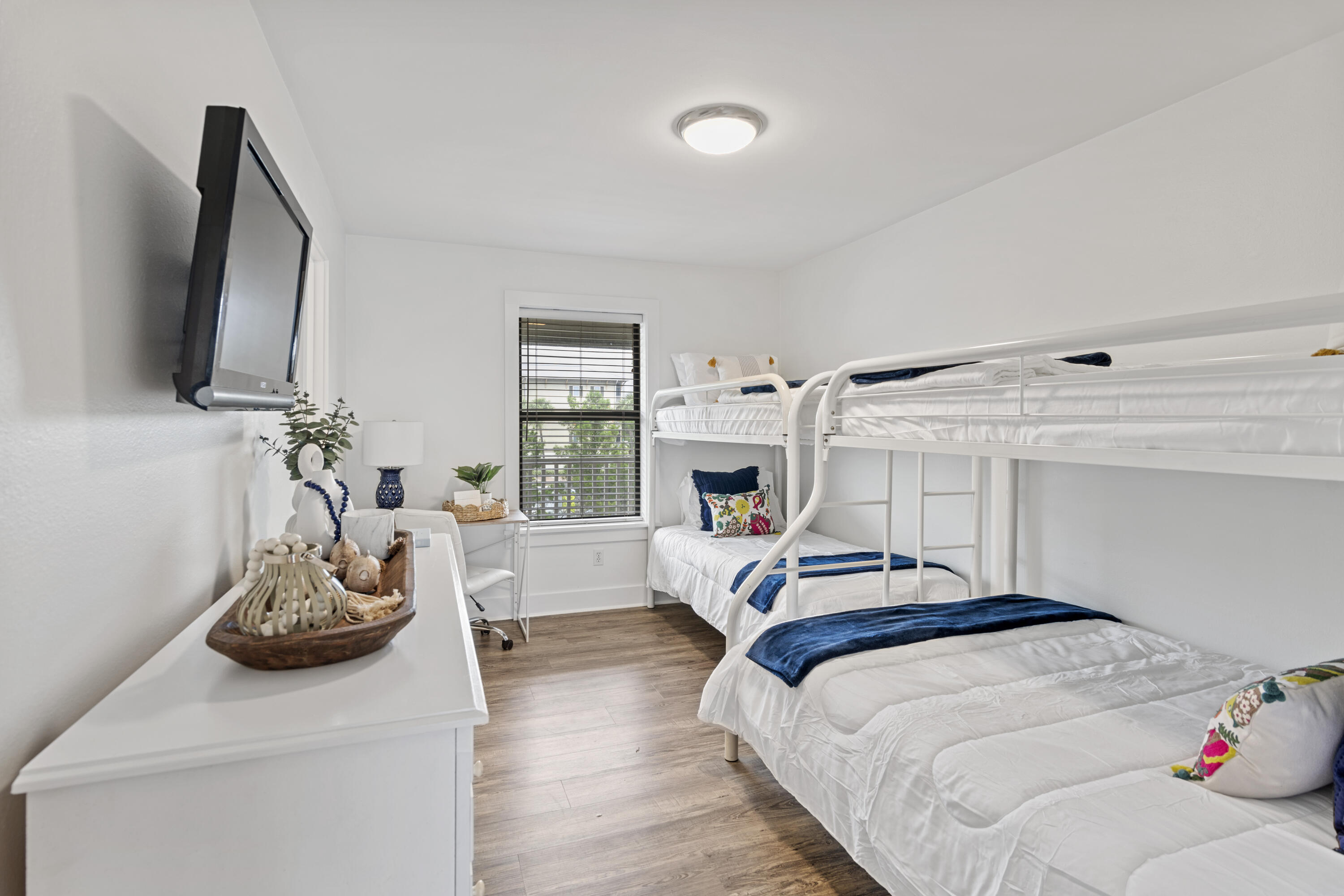 3799 East County Highway 30A, Unit F13 Santa Rosa Beach, FL 32459 - Photo 11 of 30 a bedroom with a bed and flat screen tv