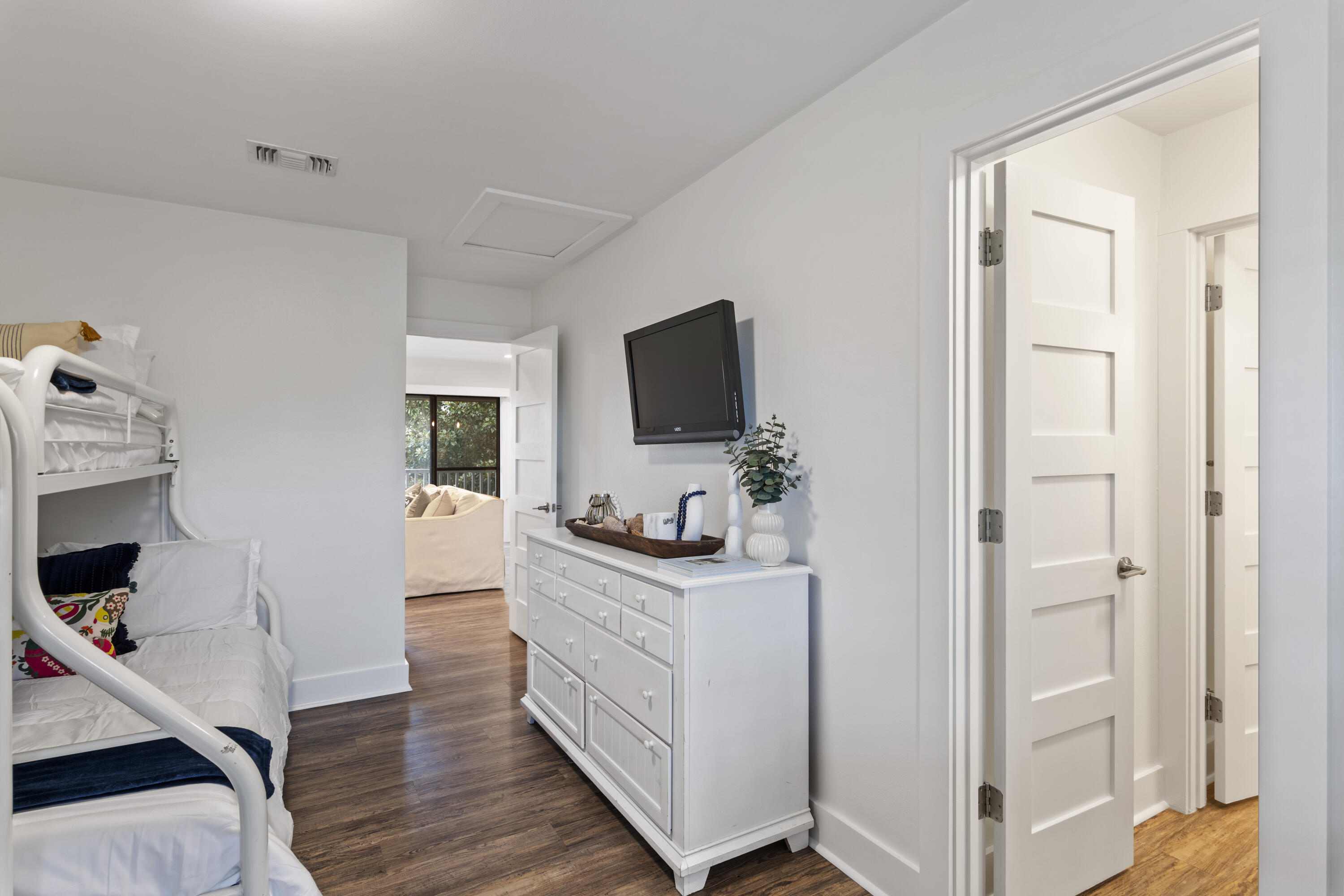 3799 East County Highway 30A, Unit F13 Santa Rosa Beach, FL 32459 - Photo 13 of 30 a living room with furniture and a flat screen tv